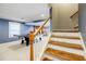 Finished basement with staircase and carpet. Features billiard table and painted walls at 656 Gunby Se Rd, Marietta, GA 30067