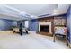 Finished basement with billiard table, fireplace, carpet and neutral decor at 656 Gunby Se Rd, Marietta, GA 30067