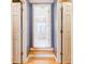 Entryway to bathroom showing a modern soaker tub and an abundance of natural light at 656 Gunby Se Rd, Marietta, GA 30067