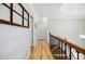 Bright hallway featuring hardwood floors and decorative trim at 656 Gunby Se Rd, Marietta, GA 30067