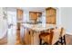 Spacious kitchen features a large granite island and hardwood flooring at 656 Gunby Se Rd, Marietta, GA 30067