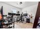 Home office area featuring multiple monitors and a large window for natural light at 1543 Blossom Dr, Atlanta, GA 30349