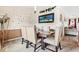 Dining area with decorative wall art, a wood table, and comfortable upholstered chairs at 1543 Blossom Dr, Atlanta, GA 30349