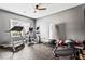 Well-equipped home gym with a treadmill, elliptical, and free weights at 1543 Blossom Dr, Atlanta, GA 30349