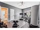 Home gym equipped with a treadmill, stationary bike, and various exercise equipment at 1543 Blossom Dr, Atlanta, GA 30349
