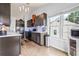 Modern kitchen with stainless steel appliances, and dark wood cabinets at 1543 Blossom Dr, Atlanta, GA 30349