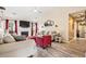 Cozy living room featuring wood floors, a fireplace, and stylish furnishings at 1543 Blossom Dr, Atlanta, GA 30349