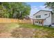 Expansive backyard featuring lush green grass and a privacy fence, perfect for outdoor enjoyment and entertaining at 1721 S Gordon Sw St, Atlanta, GA 30310