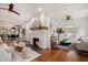 Spacious living room showcasing a fireplace, hardwood floors, and open floor plan at 1721 S Gordon Sw St, Atlanta, GA 30310