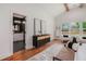 Bright main bedroom featuring a view of the ensuite bathroom and ample natural light at 1721 S Gordon Sw St, Atlanta, GA 30310