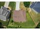 Aerial view of the home showing the roofline, landscaping and neighboring properties at 3547 Edenridge Ct, Buford, GA 30519