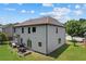 Spacious backyard with a patio set and lush green grass, perfect for outdoor entertaining and relaxation at 3547 Edenridge Ct, Buford, GA 30519