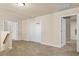 Bonus room with neutral walls and carpet featuring multiple entrances offering versatility for different uses at 3547 Edenridge Ct, Buford, GA 30519