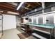 Unfinished basement workshop area with concrete walls and exposed ductwork at 3861 Foxford Dr, Atlanta, GA 30340