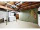 Unfinished basement with laundry area, sink, and ample storage space at 3861 Foxford Dr, Atlanta, GA 30340