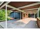 Open carport area with painted ceiling, providing sheltered parking and easy access to the home at 3861 Foxford Dr, Atlanta, GA 30340