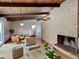 Cozy living room with stylish furnishings, hardwood floors, and a brick fireplace at 3861 Foxford Dr, Atlanta, GA 30340