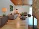 Modern living room features hardwood floors, brick fireplace, and stylish decor at 3861 Foxford Dr, Atlanta, GA 30340