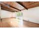 Bright living room with hardwood floors and sliding glass doors to the outside at 3861 Foxford Dr, Atlanta, GA 30340