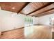 Bright living room with hardwood floors, and sliding glass doors to the outside at 3861 Foxford Dr, Atlanta, GA 30340