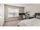 Bedroom with a study area setup near the large window and a queen size bed at 1603 Glen Ivy, Marietta, GA 30062