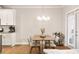 Dining Area and Kitchen, featuring modern furnishings and natural light at 1603 Glen Ivy, Marietta, GA 30062