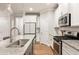 Updated kitchen with granite countertops and stainless steel appliances at 1603 Glen Ivy, Marietta, GA 30062