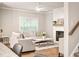 Bright living room with a fireplace and ample seating at 1603 Glen Ivy, Marietta, GA 30062