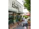 Charming outdoor seating at '7 Tequilas' with lush greenery, creating an inviting atmosphere at 1603 Glen Ivy, Marietta, GA 30062