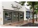 This eye-level, full shot reveals the exterior of Contrast Artisan Ales, showcasing its urban storefront at 1603 Glen Ivy, Marietta, GA 30062