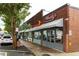 A vibrant street view featuring Woody's Cheesesteaks and other local businesses at 1603 Glen Ivy, Marietta, GA 30062