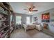 This bedroom features a ceiling fan with lighting, one bed, and a carpeted floor at 2970 Chardonnay Ln, Cumming, GA 30041