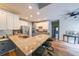 Spacious kitchen with granite countertops, stainless steel appliances, and breakfast bar at 2970 Chardonnay Ln, Cumming, GA 30041
