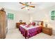 Serene bedroom featuring classic decor, ample closet space, and plenty of natural light at 322 Emily Drive Sw, Lilburn, GA 30047