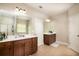 Large primary bathroom featuring double vanities, ceramic tile flooring, and glass enclosed shower at 3631 Guinevere Trace Trce, Douglasville, GA 30135