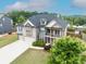 Lovely home with a multi-car garage, mature landscaping, and a spacious yard; ideal for Gathering living at 3631 Guinevere Trace Trce, Douglasville, GA 30135