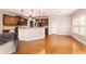 Open-concept kitchen with ample cabinet space, stainless steel appliances, and an island at 3631 Guinevere Trace Trce, Douglasville, GA 30135