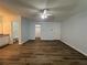 Expansive primary bedroom with ample space, ceiling fan, walk-in closet and en-suite bathroom at 8249 Creekline Ct, Riverdale, GA 30274