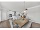 Bright, open concept featuring kitchen, dining, and living areas with hardwood flooring at 2530 Clairebrooke Bend, Atlanta, GA 30341