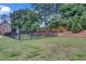 Community dog park with black metal fencing, benches, and grassy area for residents and their pets at 2530 Clairebrooke Bend, Atlanta, GA 30341