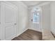 Bright foyer featuring a bench, modern door and lovely flooring at 2530 Clairebrooke Bend, Atlanta, GA 30341