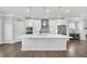 Bright kitchen featuring a large island, stainless steel appliances, and modern lighting at 2530 Clairebrooke Bend, Atlanta, GA 30341
