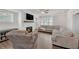 Cozy living room with a fireplace and large sectional sofa for comfortable living at 2530 Clairebrooke Bend, Atlanta, GA 30341