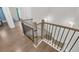 Wooden staircase featuring iron balusters and hardwood floors, leading to the upper level at 2530 Clairebrooke Bend, Atlanta, GA 30341