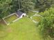 Aerial view of a horse barn, surrounded by fenced pastures at 2827 Highway 138 Ne, Conyers, GA 30013