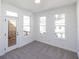 Well-lit bedroom featuring access to a private balcony, enhancing the living experience at 350 Olmstead Way # 29, Alpharetta, GA 30022