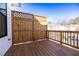 Wooden deck featuring a privacy screen and railing, perfect for outdoor enjoyment at 350 Olmstead Way # 29, Alpharetta, GA 30022
