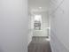 Walk-in closet offering ample storage with built-in shelving and a window for natural light at 350 Olmstead Way # 29, Alpharetta, GA 30022