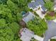 Aerial view of homes featuring mature trees, backyard pools, and well-maintained lawns at 1488 Lachona Ne Ct, Atlanta, GA 30329