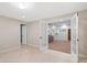 Bonus room with tile floors leading to living room through double doors at 1488 Lachona Ne Ct, Atlanta, GA 30329